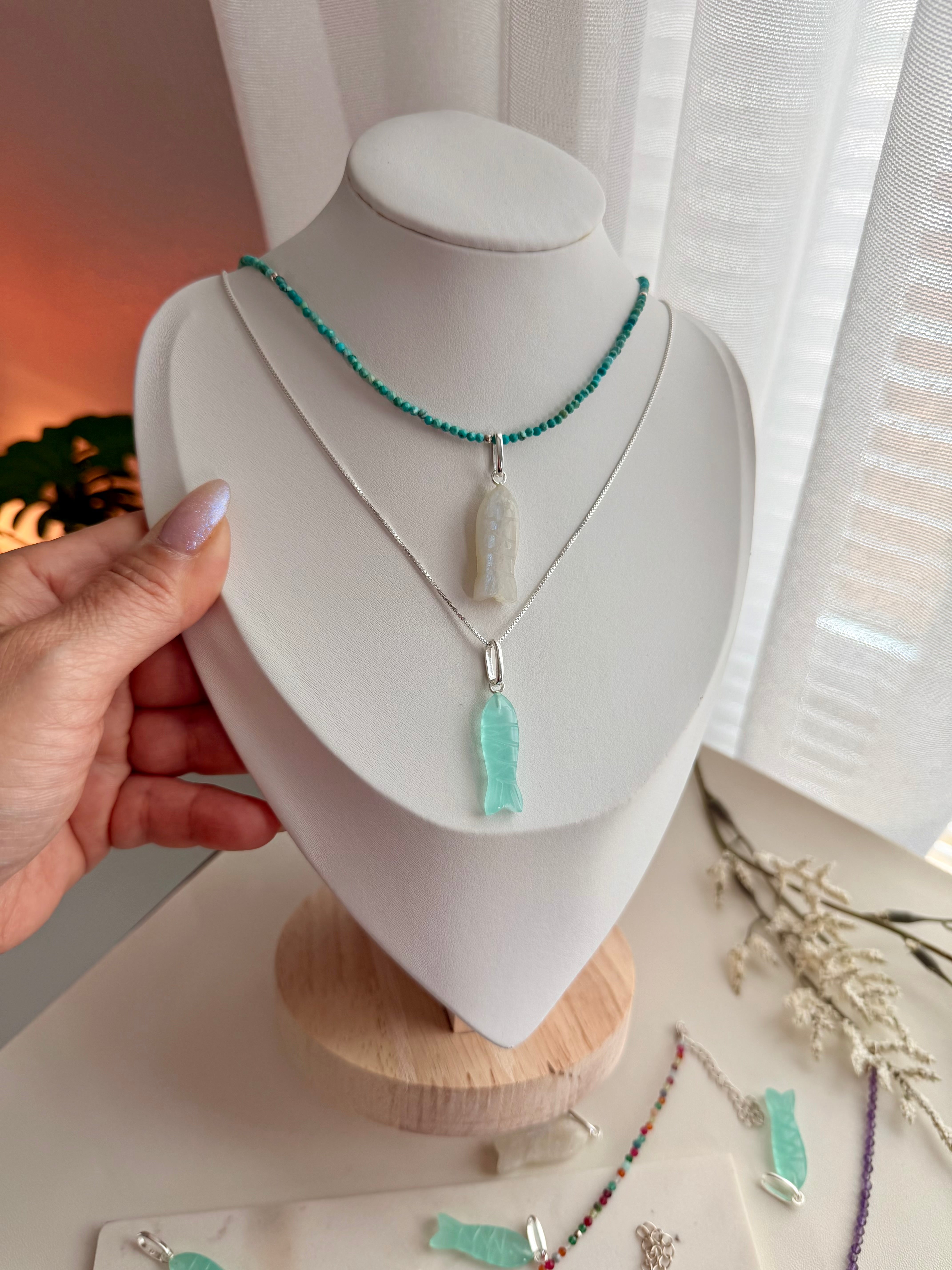 Delmar stone fish pendant