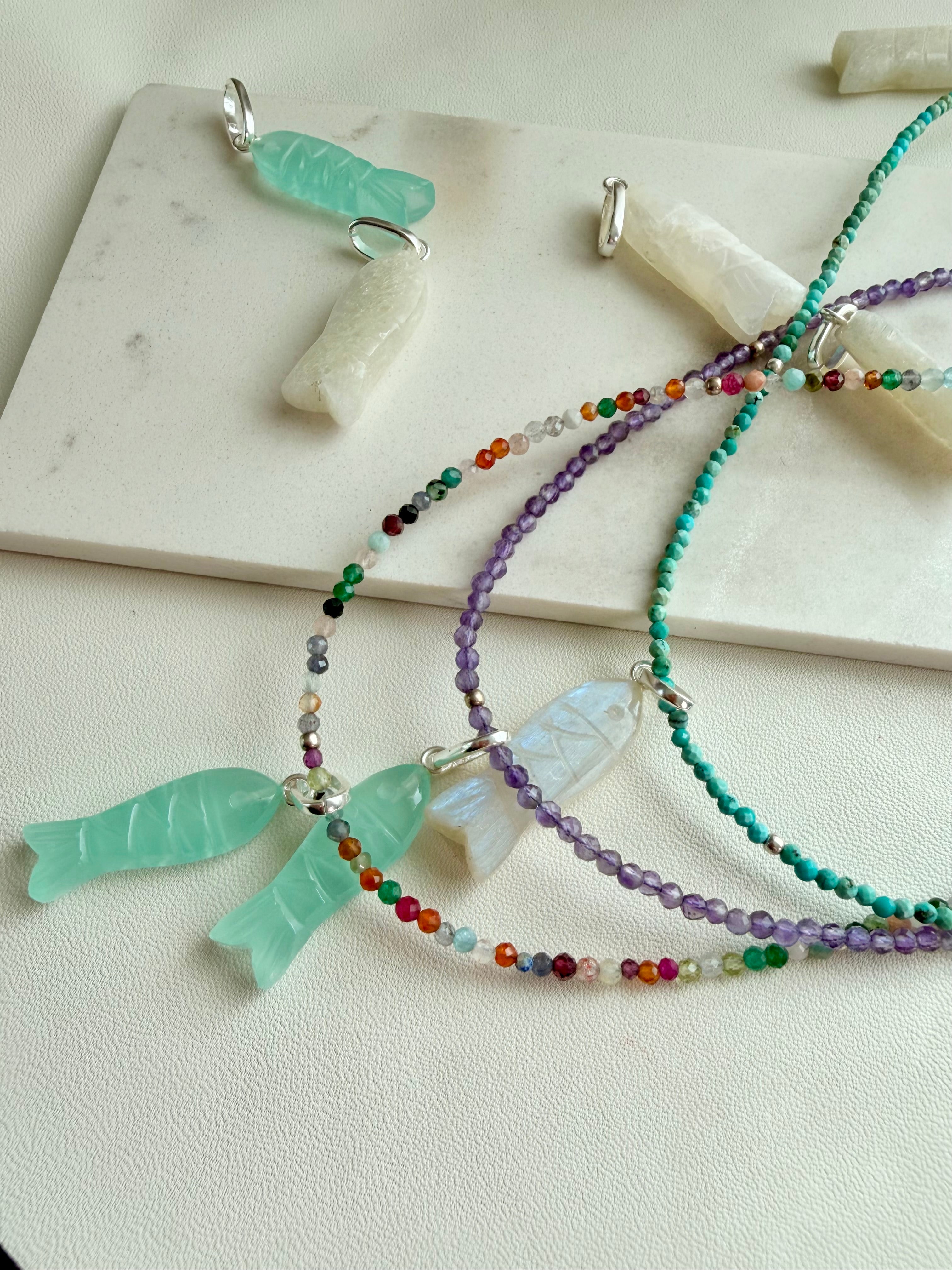 Delmar stone fish pendant