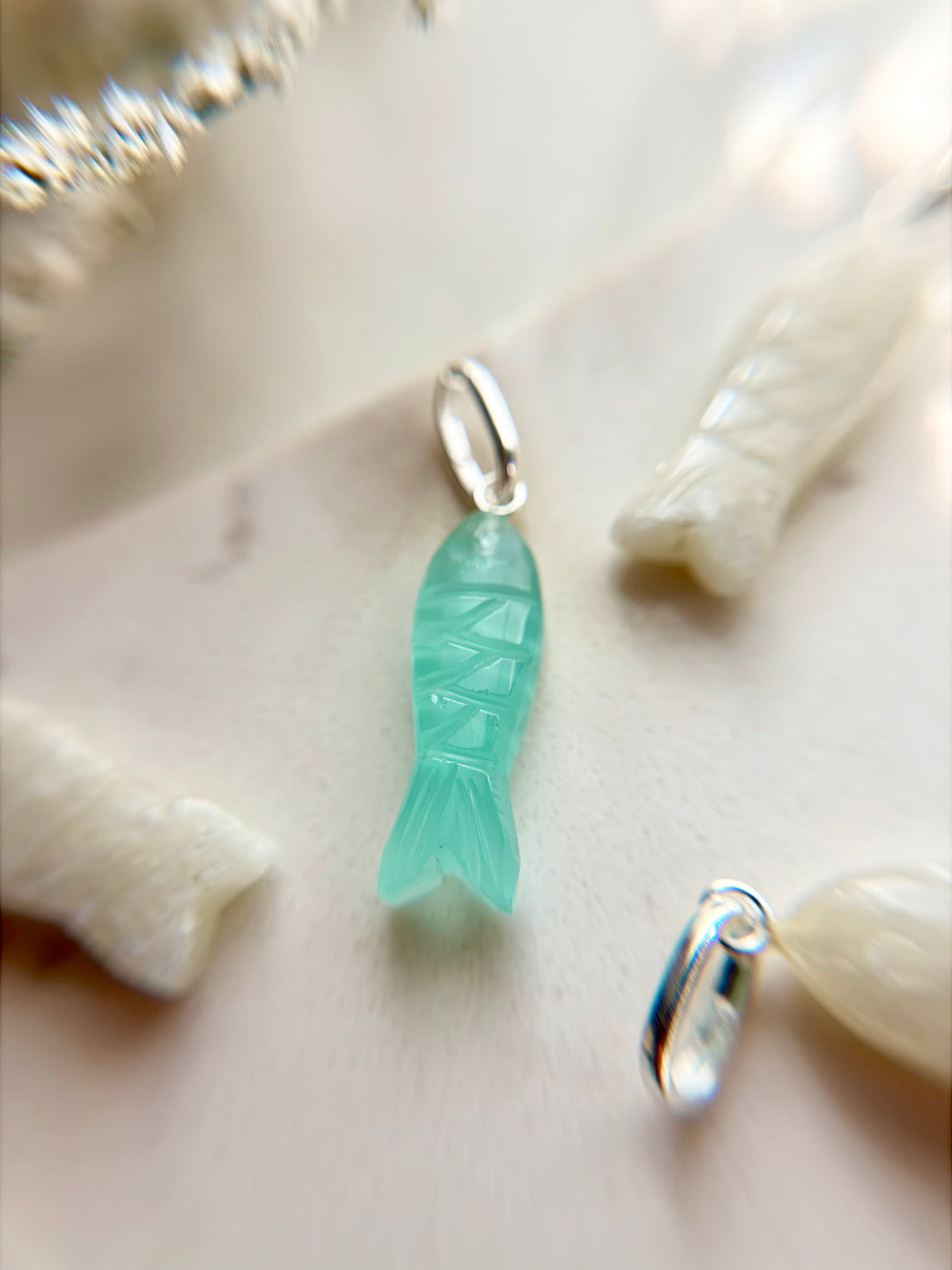 Delmar stone fish pendant